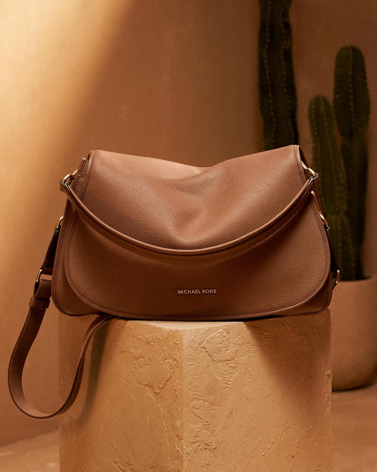 image:imageMichael Kors Mens Holmes Extralarge Convertible MessengerGoldtone HardwareMatte Pebble LeatherLuggage